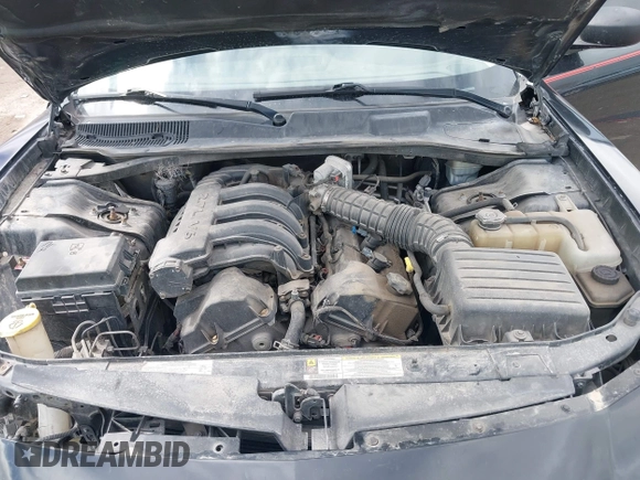2008 Dodge Charger with VIN 2B3KA43R28H277586, listed as a IAAI auction lot 41881774 with 185,441 mi miles and . Bid and sale history available at carsss.com. Image 10.