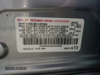2011 Mitsubishi Outlander SE z VIN JA4AR4AU2BZ023338, wystawiony jako Copart lot #44125975 z przebiegiem 156 342 mil mil oraz Czysty tytuł • Clean title. Historia ofert i sprzedaży dostępna na DreamBid. Obrazek 13.