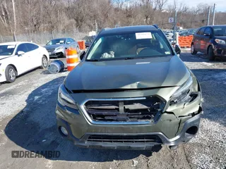 2019 Subaru Outback Touring with VIN 4S4BSATC7K3272301, listed as a IAAI auction lot 41318172 with 102,417 mi miles and . Bid and sale history available at DreamBid. Image 6.