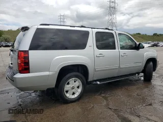 2011 Chevrolet Suburban LT with VIN 1GNSKJE31BR224959, listed as a Copart auction lot 58974345 with Not provided miles and Salvage title. Bid and sale history available at DreamBid. Image 3.