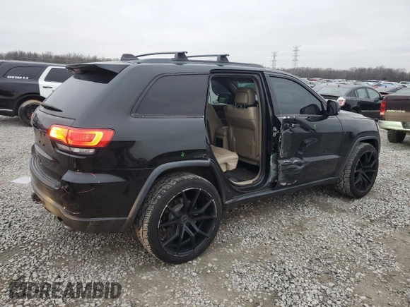 2014 Jeep Grand Cherokee Limited with VIN 1C4RJEBT5EC213332, listed as a Copart auction lot 87583515 with 152,409 mi miles and Salvage Title. Bid and sale history available at DreamBid. Image 3.