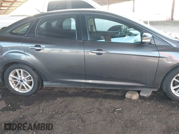 2016 Ford Focus SE with VIN 1FADP3F28GL330815, listed as a IAAI auction lot 41696821 with 125,247 mi miles. Bid and sale history available at carsss.com. Image 13.