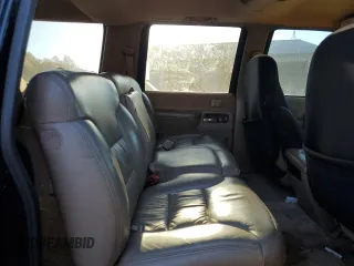 1994 Chevrolet Suburban with VIN 1GNFK16K0RJ417930, listed as a Copart auction lot 77583634 with 252,477 mi miles and Salvage Title. Bid and sale history available at carsss.com. Image 11.