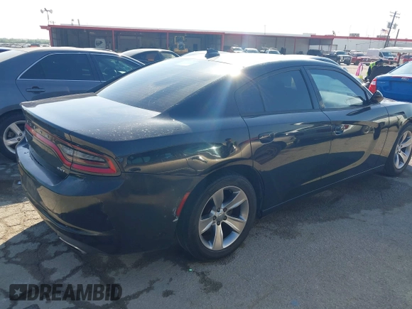 2016 Dodge Charger SXT with VIN 2C3CDXHG8GH354631, listed as a IAAI auction lot 42036201 with 196,344 mi miles and . Bid and sale history available at carsss.com. Image 4.
