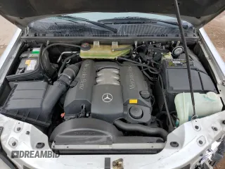 1999 Mercedes-Benz M 320/430/500 with VIN 4JGAB54E7XA078616, listed as a Copart auction lot 55301695 with 137,918 mi miles and Salvage title. Bid and sale history available at DreamBid. Image 12.