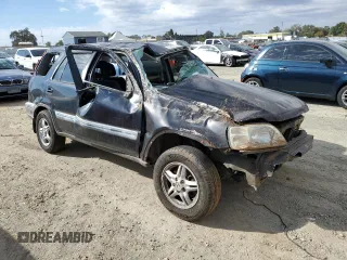 2000 Honda CR-V EX with VIN JHLRD1868YS012121, listed as a Copart auction lot 76367674 with 80,323 mi miles and Non Repairable. Bid and sale history available at carsss.com. Image 4.