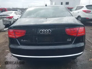 2012 Audi A8 L with VIN WAURVAFD8CN006917, listed as a IAAI auction lot 40877090 with 144,387 mi miles. Bid and sale history available at carsss.com. Image 16.
