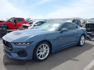 2024 Ford Mustang GT with VIN 1FA6P8CF5R5407998, listed as a IAAI auction lot 42228052 with 12,863 mi miles and . Bid and sale history available at DreamBid. Image 2.