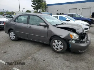 2005 Toyota Corolla CE with VIN 1NXBR32EX5Z403620, listed as a Copart auction lot 58641705 with 38,270 mi miles and Salvage title. Bid and sale history available at DreamBid. Image 4.