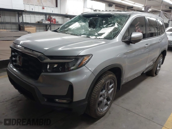2023 Honda Passport EX-L with VIN 5FNYF8H56PB025612, listed as a IAAI auction lot 41937956 with 31,065 mi miles and . Bid and sale history available at DreamBid. Image 17.