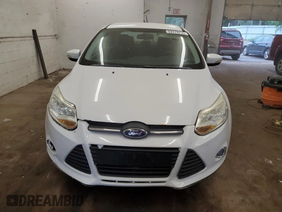 2012 Ford Focus SE with VIN 1FAHP3F23CL236482, listed as a Copart auction lot 62279735 with 127,239 mi miles and Salvage title. Bid and sale history available at DreamBid. Image 5.