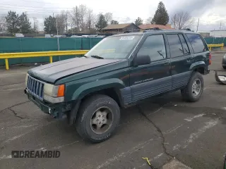 1996 Jeep Grand Cherokee Laredo with VIN 1J4GZ58S6TC165636, listed as a Copart auction lot 51485235 with 266,873 mi miles and Salvage Title. Bid and sale history available at carsss.com. Image 1.