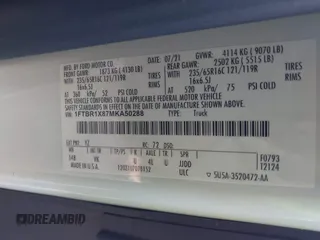 2021 Ford Transit Cargo with VIN 1FTBR1X87MKA50288, listed as a IAAI auction lot 41432535 with 96,934 mi miles and . Bid and sale history available at DreamBid. Image 9.