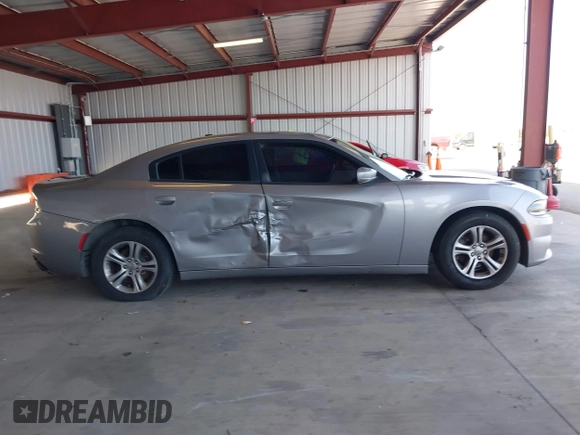 2015 Dodge Charger SE with VIN 2C3CDXBG1FH840060, listed as a IAAI auction lot 42111676 with 165,479 mi miles and . Bid and sale history available at carsss.com. Image 13.