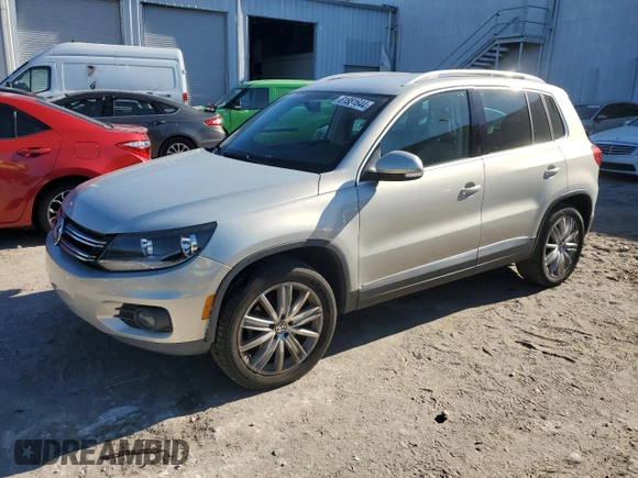 2012 Volkswagen Tiguan SE z VIN WVGAV7AX9CW531219, wystawiony jako Copart lot #81881644 z przebiegiem 125 695 mil mil oraz Szkoda całkowita • Salvage title. Historia ofert i sprzedaży dostępna na DreamBid. Obrazek 1.