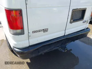 1998 Ford Econoline Cargo with VIN 1FTRE1420WHB15038, listed as a IAAI auction lot 41826051 with 338,809 mi miles. Bid and sale history available at carsss.com. Image 17.
