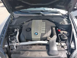 2012 BMW X5 35d with VIN 5UXZW0C56CL664575, listed as a IAAI auction lot 42559674 with 157,554 mi miles and . Bid and sale history available at DreamBid. Image 10.