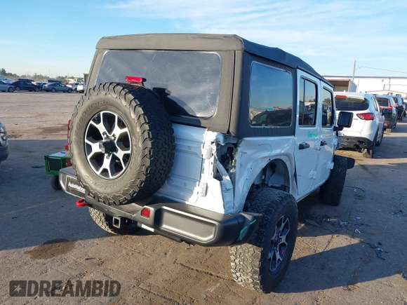 2022 Jeep Wrangler Unlimited Rubicon with VIN 1C4HJXFN4NW123803, listed as a IAAI auction lot 40994742 with 36,156 mi miles and . Bid and sale history available at DreamBid. Image 4.