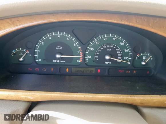 2003 Jaguar S-Type with VIN SAJEA01T43FM62477, listed as a Copart auction lot 52693085 with 109,761 mi miles and Salvage Title. Bid and sale history available at DreamBid. Image 9.