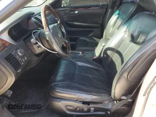 2007 Cadillac DTS V8 z VIN 1G6KD57Y87U140129, wystawiony jako Copart lot #48025875 z przebiegiem 184 526 mil mil oraz Szkody całkowita. Historia ofert i sprzedaży dostępna na DreamBid. Obrazek 7.