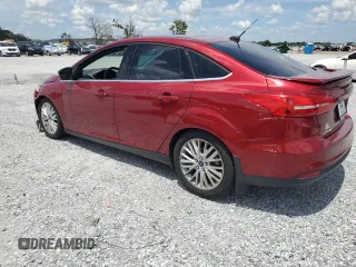 2016 Ford Focus Titanium with VIN 1FADP3J29GL274147, listed as a Copart auction lot 61377575 with 88,181 mi miles and Salvage title. Bid and sale history available at DreamBid. Image 2.