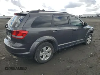 2015 Dodge Journey American Value with VIN 3C4PDCAB5FT728655, listed as a Copart auction lot 47074235 with 125,923 mi miles and Salvage Title. Bid and sale history available at DreamBid. Image 3.