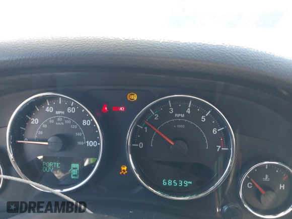 2018 Jeep Wrangler JK Unlimited Sport S with VIN 1C4BJWDG4JL868700, listed as a IAAI auction lot 41349566 with 68,539 mi miles. Bid and sale history available at carsss.com. Image 7.