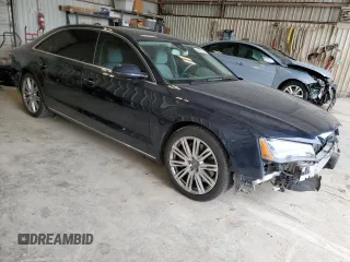 2013 Audi A8 4.0L с VIN WAUR2AFD6DN020907, выставлен на аукционе Copart как лот 54742325 с пробегом 88 042 миль миль и Списание • Salvage title. История ставок и продаж доступна на DreamBid. Изображение 4.
