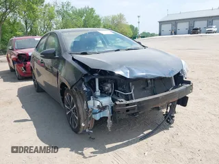 2018 Toyota Corolla L with VIN 2T1BURHE1JC111066, listed as a IAAI auction lot 42215074 with 106,677 mi miles and . Bid and sale history available at DreamBid. Image 6.