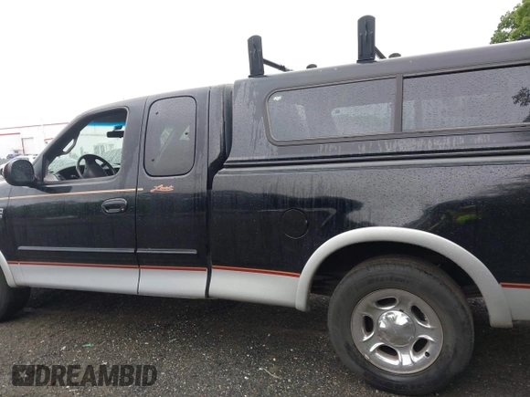 2000 Ford F-150 XL z VIN 1FTRX17L2YNB60131, wystawiony jako IAAI lot #42295537 z przebiegiem 216 638 mil mil oraz . Historia ofert i sprzedaży dostępna na DreamBid. Obrazek 14.