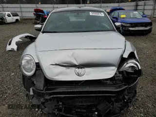 2012 Volkswagen Beetle 2.5L w/Sun with VIN 3VWJX7AT6CM658258, listed as a Copart auction lot 50589075 with 122,877 mi miles and Salvage Title. Bid and sale history available at carsss.com. Image 5.