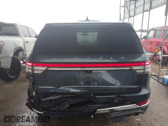2022 Lincoln Aviator Reserve z VIN 5LM5J7WC2NGL15256, wystawiony jako IAAI lot #41533621 z przebiegiem 35 683 mil mil oraz . Historia ofert i sprzedaży dostępna na DreamBid. Obrazek 16.