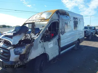 2020 Ford Transit Cargo with VIN 1FTBR3X82LKA42643, listed as a IAAI auction lot 41398109 with Not Provided miles. Bid and sale history available at carsss.com. Image 2.