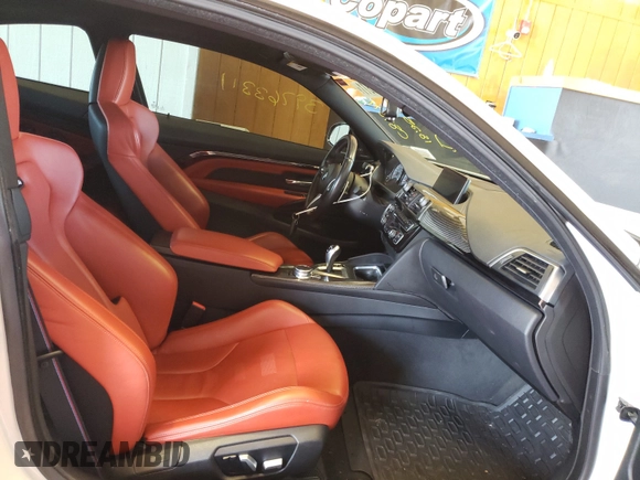2018 BMW M4 with VIN WBS4Y9C52JAC87077, listed as a Copart auction lot 44323394 with 18,253 mi miles. Bid and sale history available at carsss.com. Image 5.