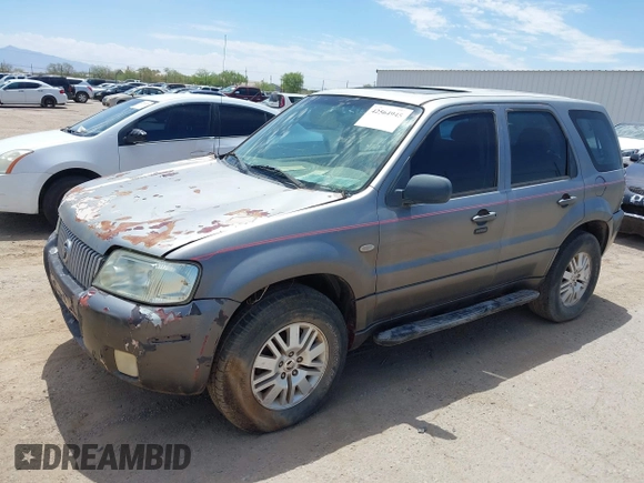 2006 Mercury Mariner Convenience with VIN 4M2YU56ZX6DJ04338, listed as a IAAI auction lot 42564945 with 99,570 mi miles and . Bid and sale history available at DreamBid. Image 2.