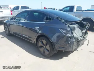 2018 Tesla Model 3 Long Range Battery with VIN 5YJ3E1EA4JF157782, listed as a IAAI auction lot 41774169 with 123,239 mi miles. Bid and sale history available at carsss.com. Image 3.