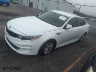 2017 Kia Optima LX with VIN 5XXGT4L30HG156438, listed as a IAAI auction lot 34861118 with 52,128 mi miles. Bid and sale history available at carsss.com. Image 2.