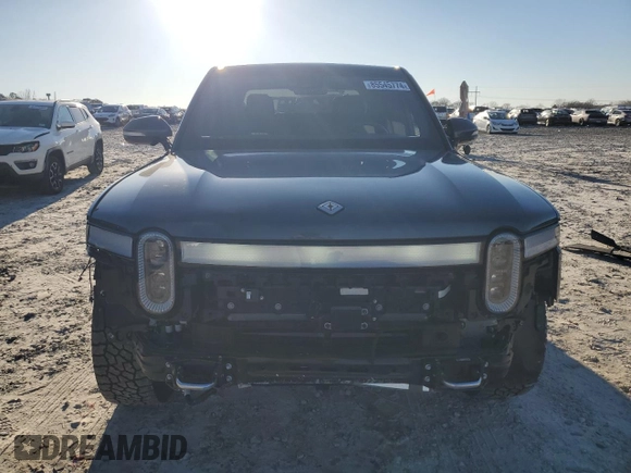 2023 Rivian R1T Adventure z VIN 7FCTGAAA1PN022134, wystawiony jako Copart lot #85545774 z przebiegiem 48 951 mil mil oraz Szkoda całkowita • Salvage title. Historia ofert i sprzedaży dostępna na DreamBid. Obrazek 5.