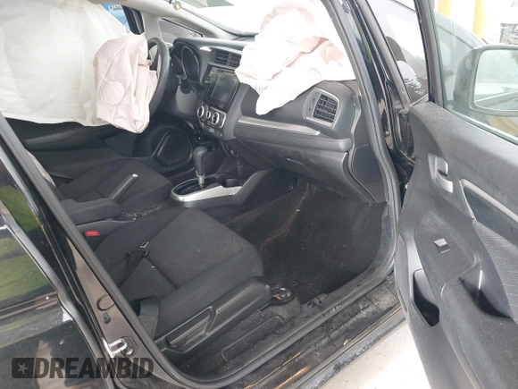 2015 Honda Fit EX-L z VIN 3HGGK5H81FM701122, wystawiony jako IAAI lot #42610165 z przebiegiem 74 969 mil mil oraz . Historia ofert i sprzedaży dostępna na DreamBid. Obrazek 5.