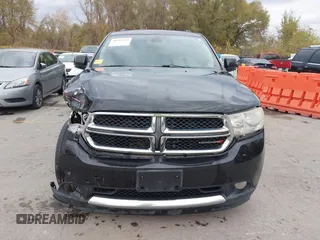 2013 Dodge Durango Crew with VIN 1C4RDHDG8DC592706, listed as a IAAI auction lot 40745114 with 95,757 mi miles and . Bid and sale history available at DreamBid. Image 12.