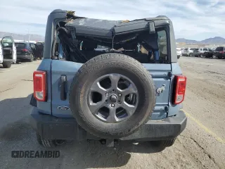 2023 Ford Bronco z VIN 1FMDE5AH6PLB63177, wystawiony jako Copart lot #52208625 z przebiegiem 10 865 mil mil oraz Szkoda całkowita • Salvage title. Historia ofert i sprzedaży dostępna na DreamBid. Obrazek 6.
