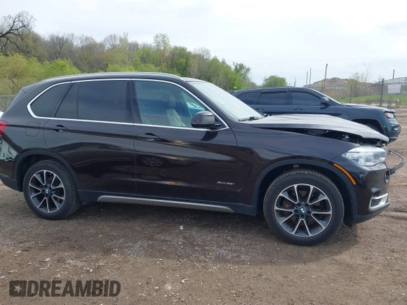 2017 BMW X5 xDrive35i z VIN 5UXKR0C56H0U49957, wystawiony jako IAAI lot #42183768 z przebiegiem 96 346 mil mil oraz . Historia ofert i sprzedaży dostępna na DreamBid. Obrazek 13.
