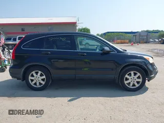 2007 Honda CR-V EX z VIN JHLRE48597C027550, wystawiony jako IAAI lot #42444748 z przebiegiem 211 437 mil mil oraz . Historia ofert i sprzedaży dostępna na DreamBid. Obrazek 14.
