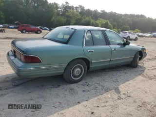 1997 Mercury Grand Marquis GS z VIN 2MELM74W2VX663313, wystawiony jako Copart lot #59539665 z przebiegiem 260 024 mil mil oraz Czysty tytuł • Clean title. Historia ofert i sprzedaży dostępna na DreamBid. Obrazek 3.