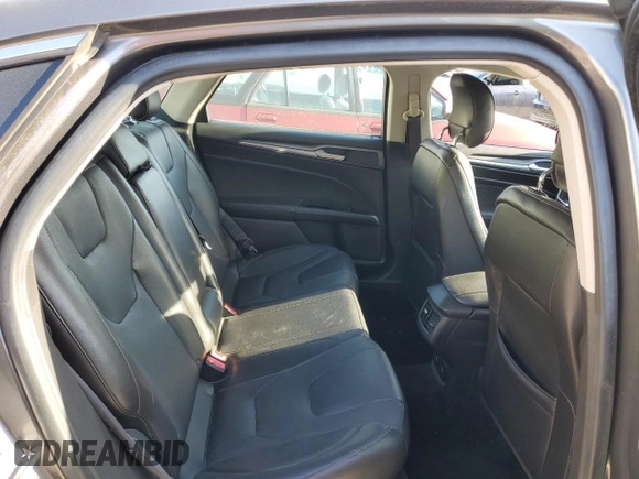 2014 Ford Fusion Titanium с VIN 3FA6P0K91ER218320, выставлен на аукционе Copart как лот 41871285 с пробегом 80 151 миль миль и На запчасти • Non repairable. История ставок и продаж доступна на DreamBid. Изображение 10.