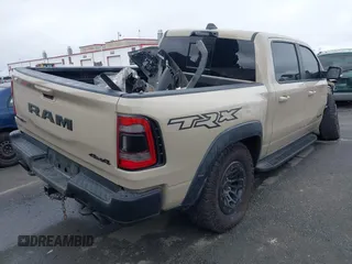 2022 Ram 1500 TRX with VIN 1C6SRFU92NN383774, listed as a IAAI auction lot 41788415 with 34,646 mi miles and . Bid and sale history available at DreamBid. Image 4.