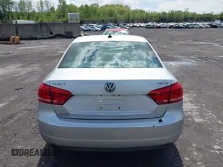 2014 Volkswagen Passat SE with VIN 1VWBT7A32EC070023, listed as a IAAI auction lot 42202567 with 116,438 mi miles and . Bid and sale history available at DreamBid. Image 16.