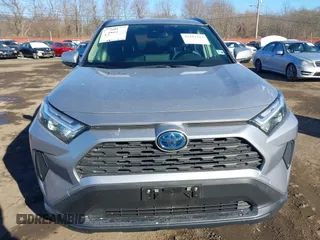 2023 Toyota RAV4 Hybrid LE with VIN JTMMWRFV6PD186024, listed as a IAAI auction lot 41417213 with 9,217 mi miles. Bid and sale history available at carsss.com. Image 12.