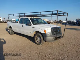 2014 Ford F-150 XL with VIN 1FTFX1CT8EKG36033, listed as a IAAI auction lot 41821235 with 165,934 mi miles. Bid and sale history available at carsss.com. Image 1.