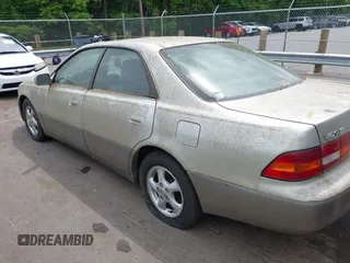 1998 Lexus ES 300 Luxury Sport Sdn with VIN JT8BF28G2W5023651, listed as a IAAI auction lot 42106837 with 245,107 mi miles. Bid and sale history available at carsss.com. Image 3.